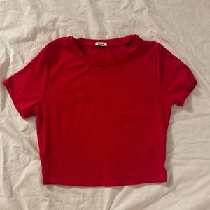 red garage crop top